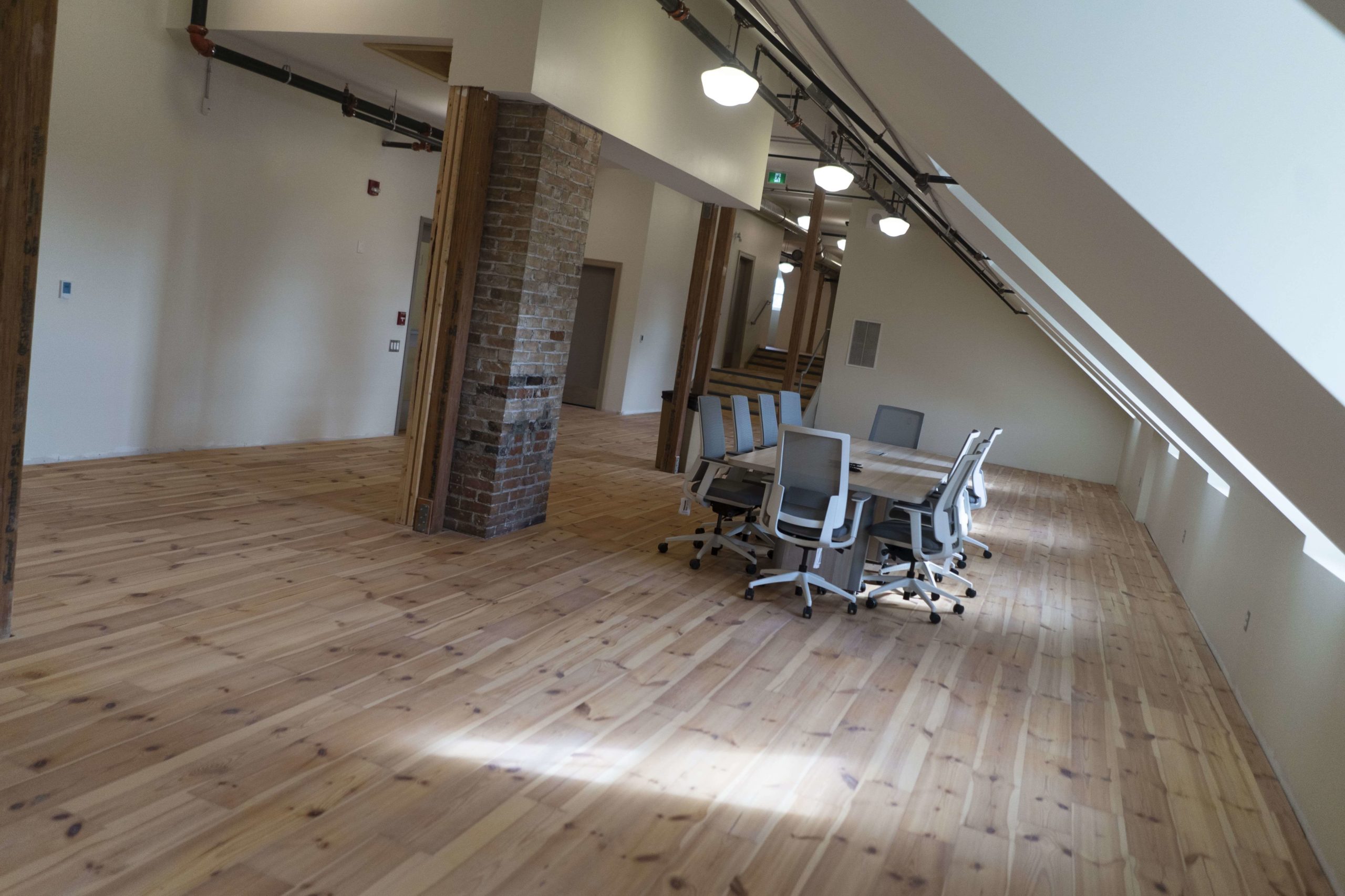 Open office space with desk and chairs