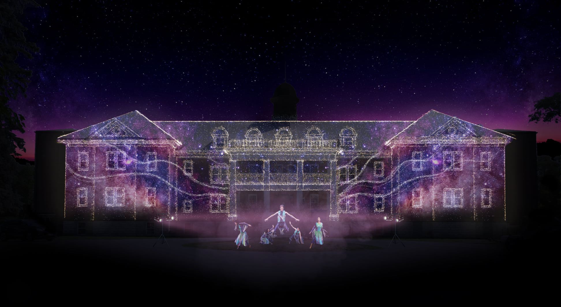 3D of Mohawk Institute Residential School illuminated at night, five performers out front