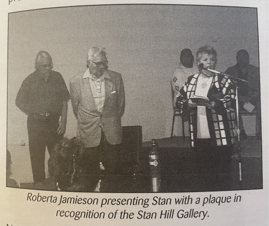 Roberta Jamieson presenting Stan Hill with a plaque in recognition of the Stan Hill Gallery